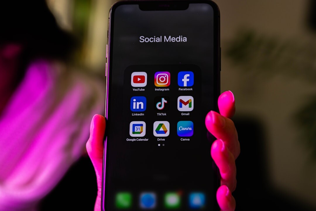 Smartphone showing social media analytics graphs