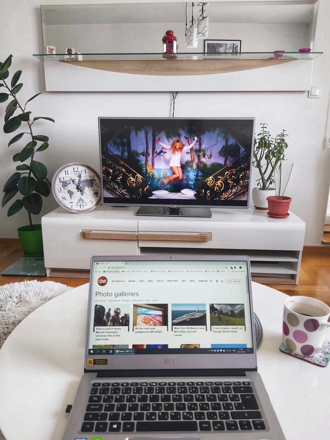 Video editing timeline on a laptop screen with colorful clips