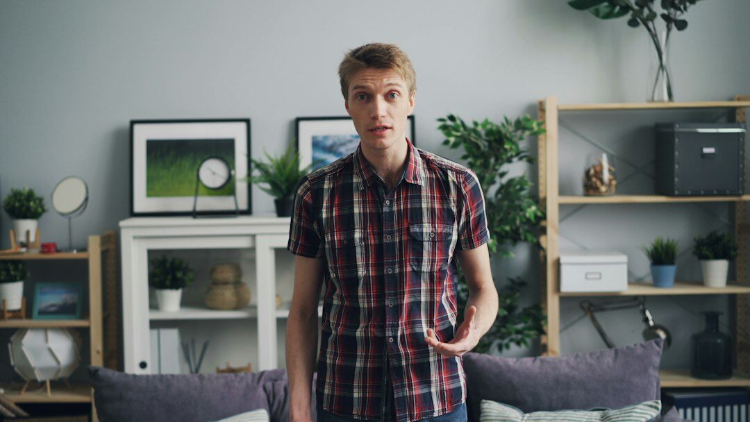 Young man recording a dance video for social media