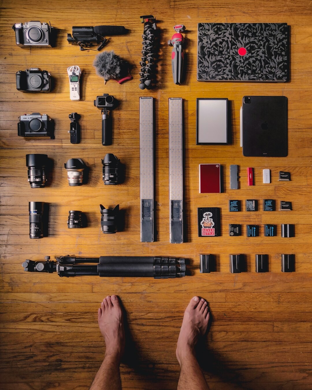 Flat lay of smartphone, tripod and props for vertical video creation